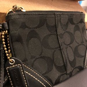 Small black COACH CC’s wristlet.